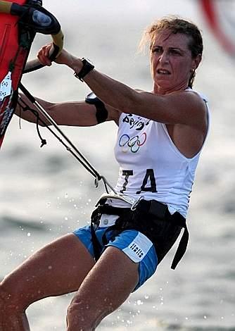 beijing_sensini_44.JPG - epa01448078 Italian female windsurfer Alessandra Sensini speeds her boat during the race in the Qingdao Olympic sailing area, China, 15 August 2008.  EPA/ADI WEDA