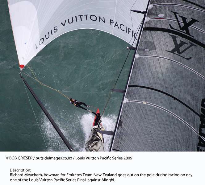 20090213-1116.jpg - Louis Vuitton Pacific Series 2009 Auckland, New Zealand. Richard Meachem, bowman for Emirates Team New Zealand goes out on the pole during racing on day one of the Louis Vuitton Pacific Series Final  against Alinghi.  Must Credit: Bob Grieser/Outsideimages.co.nz